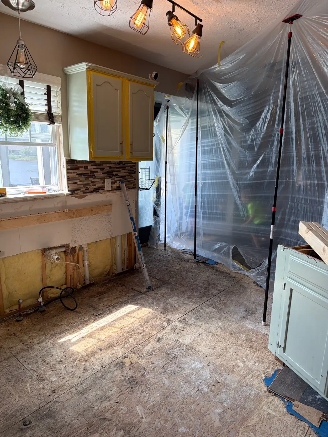 Drying setup in Brownstown finished basement after water event